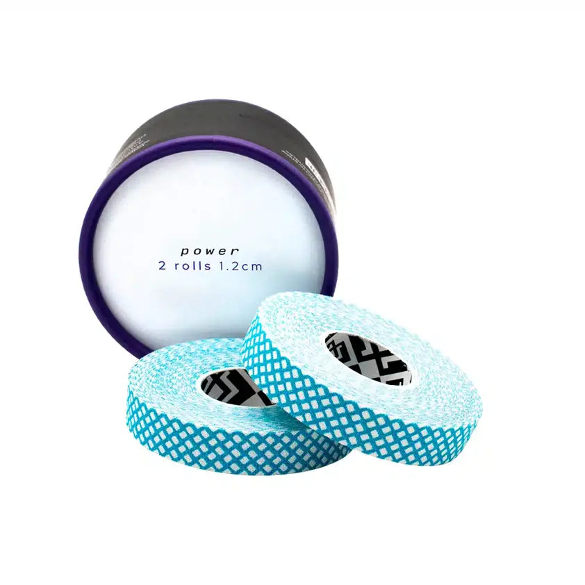 Roll of blue tape with white dots on a white background