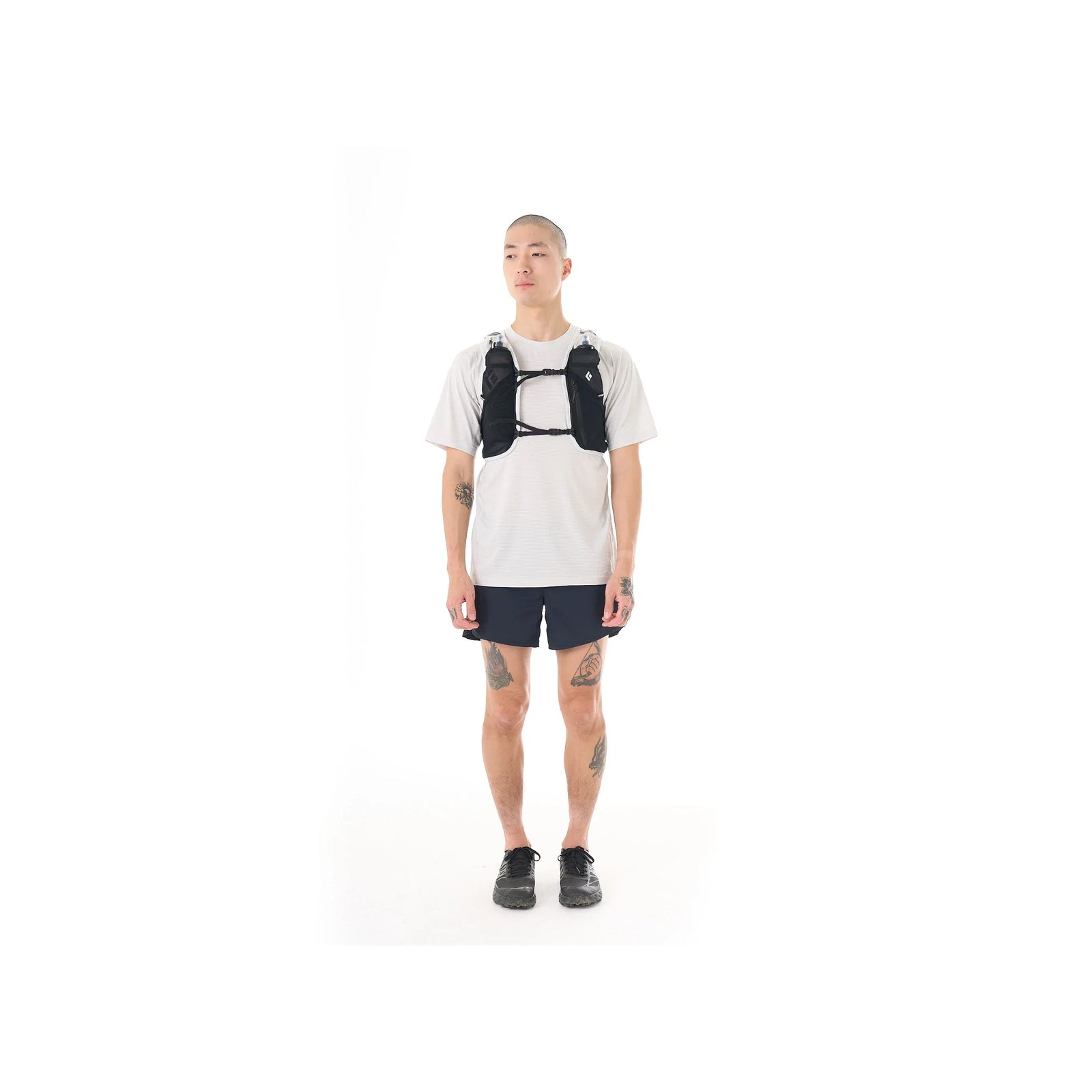 Black and white hydration vest on a white background