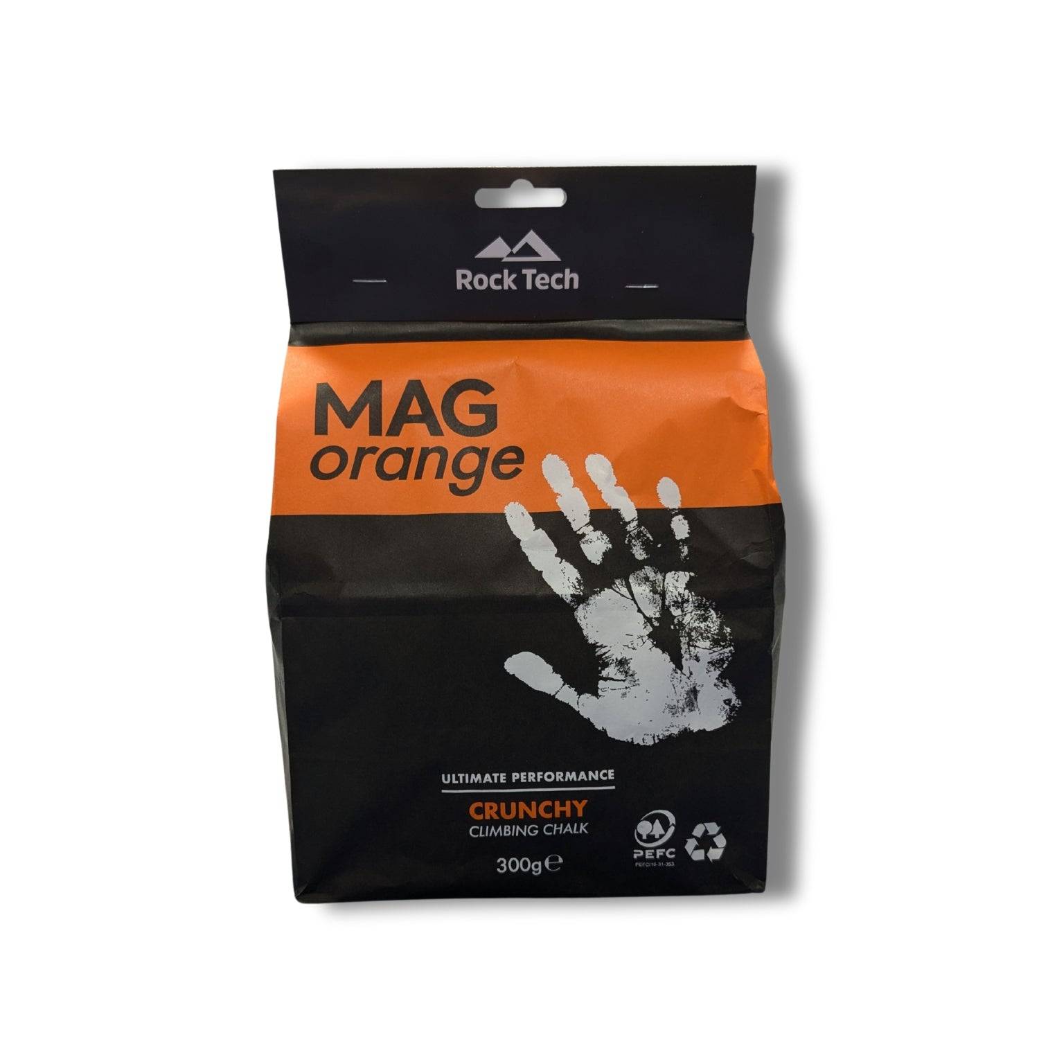 A package of Rock Technologies MAG Orange Chalk 300g. The package is predominantly black and orange with a hand print graphic and product information.