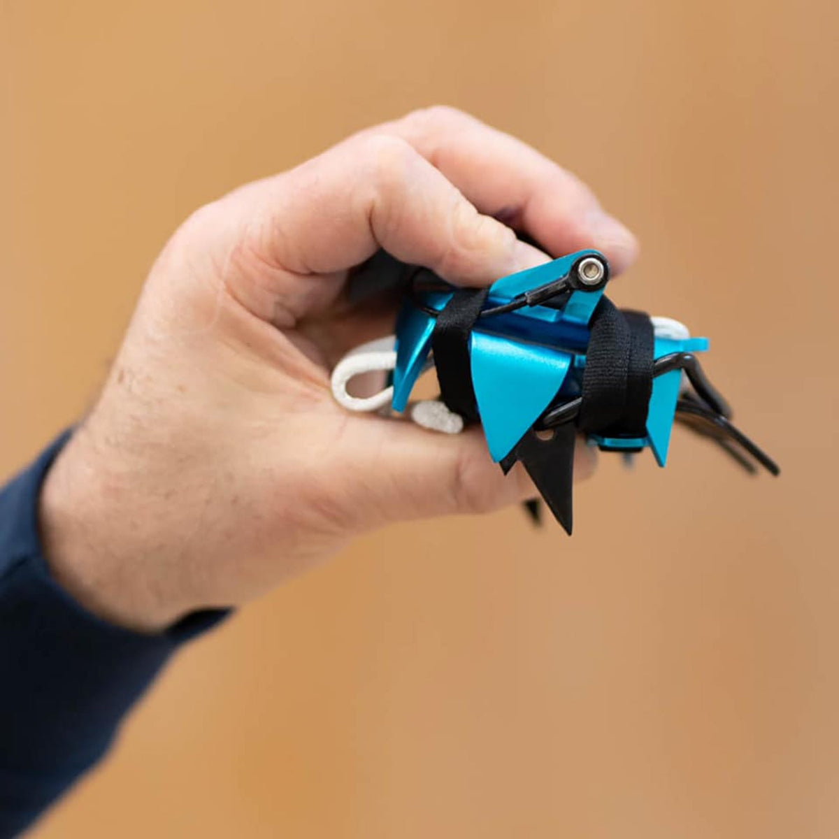 Blue Ice Harfang Crampon folded up