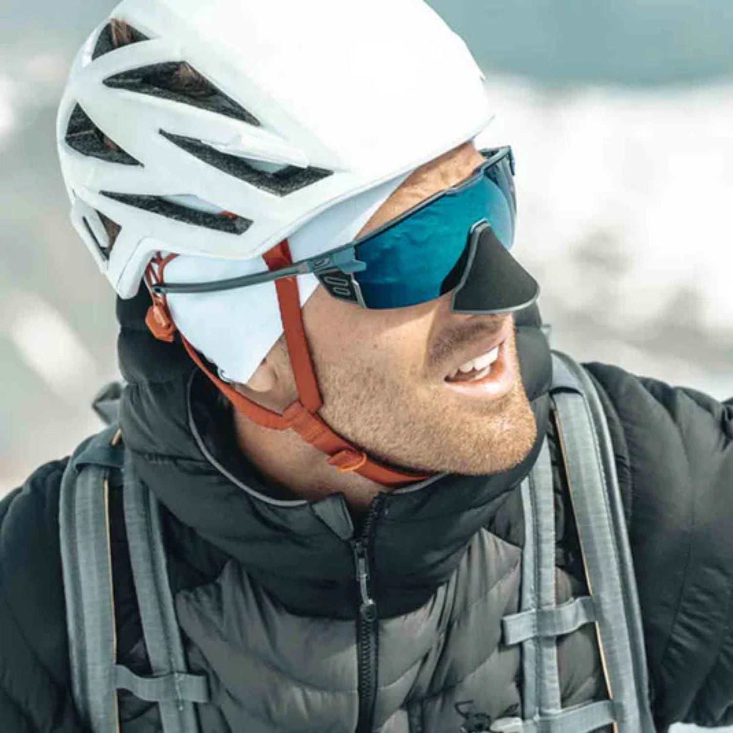 Sunglasses with reflective lenses on a white background