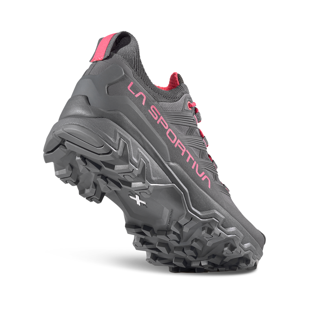 Gray hiking shoe with pink accents and 'La Sportiva' branding on a white background
